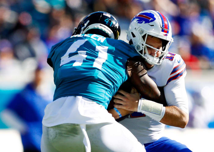 Jacksonville Jaguars outside linebacker Josh Allen (41) sacks Buffalo Bills quarterback Josh Allen (17) in the first half at TIAA Bank Field.